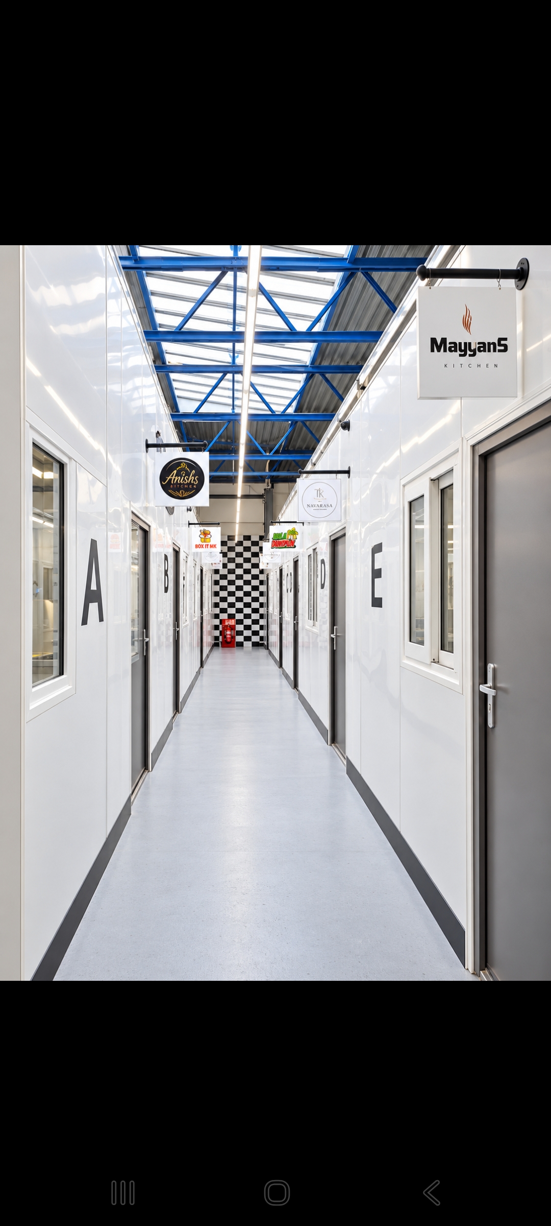 Foody Kitchenz internal corridor with commercial kitchen units